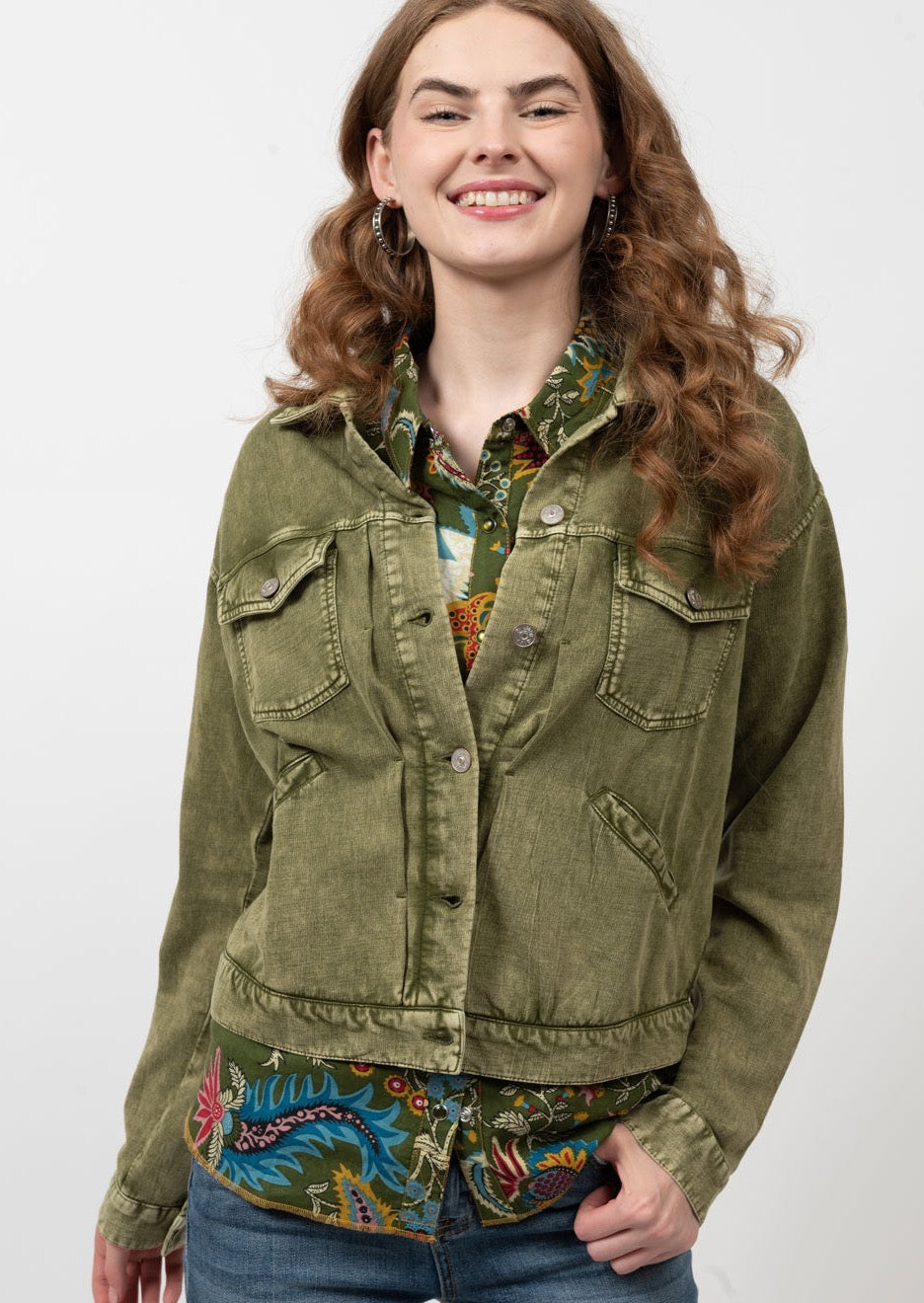 Olive green hip length denim jacket with flap pockets and collar