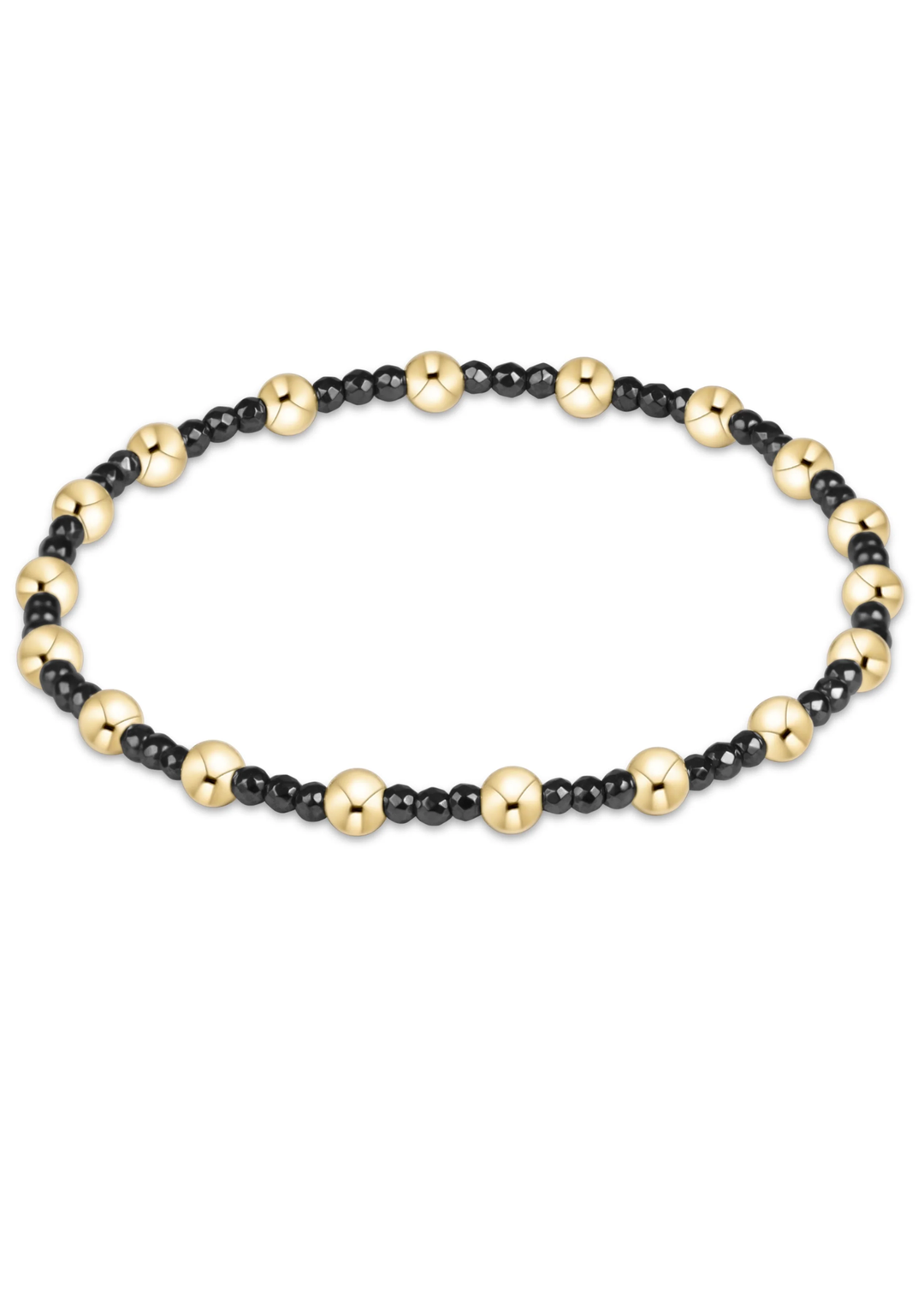 A beaded stretch bracelet featuring alternating large polished gold-tone beads and smaller matte black beads, displayed on a clean white background.