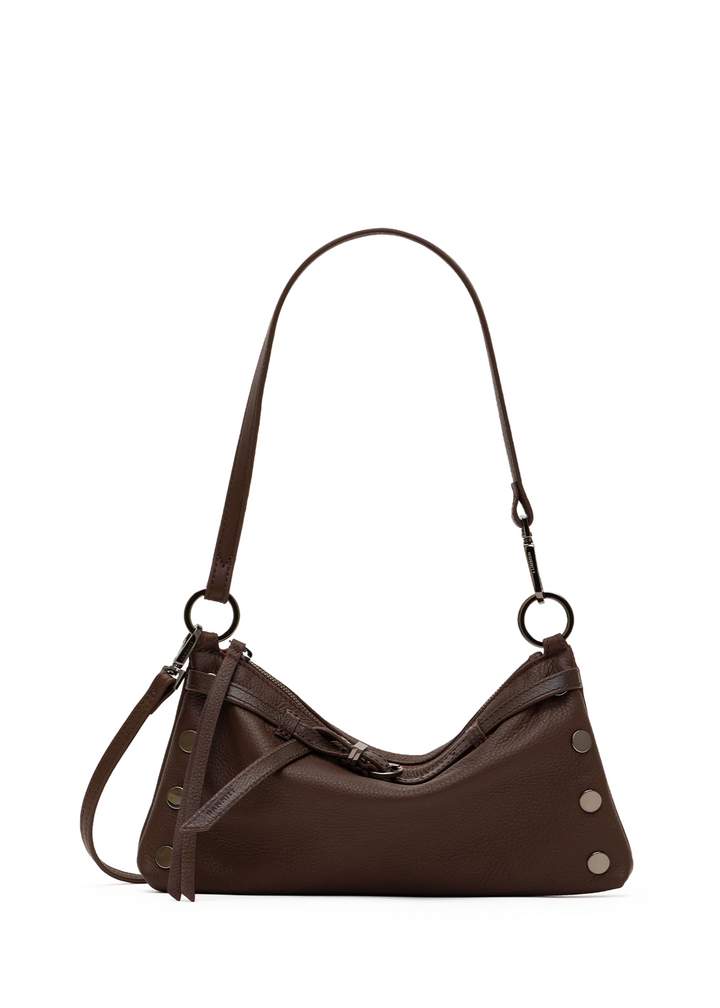 A brown suede handbag with strap up.