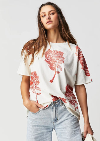 Ivory tee with distressed rose print graphic