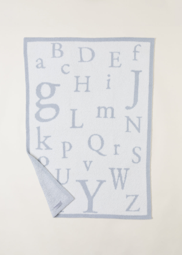 Blue and white ABC pattern blanket
