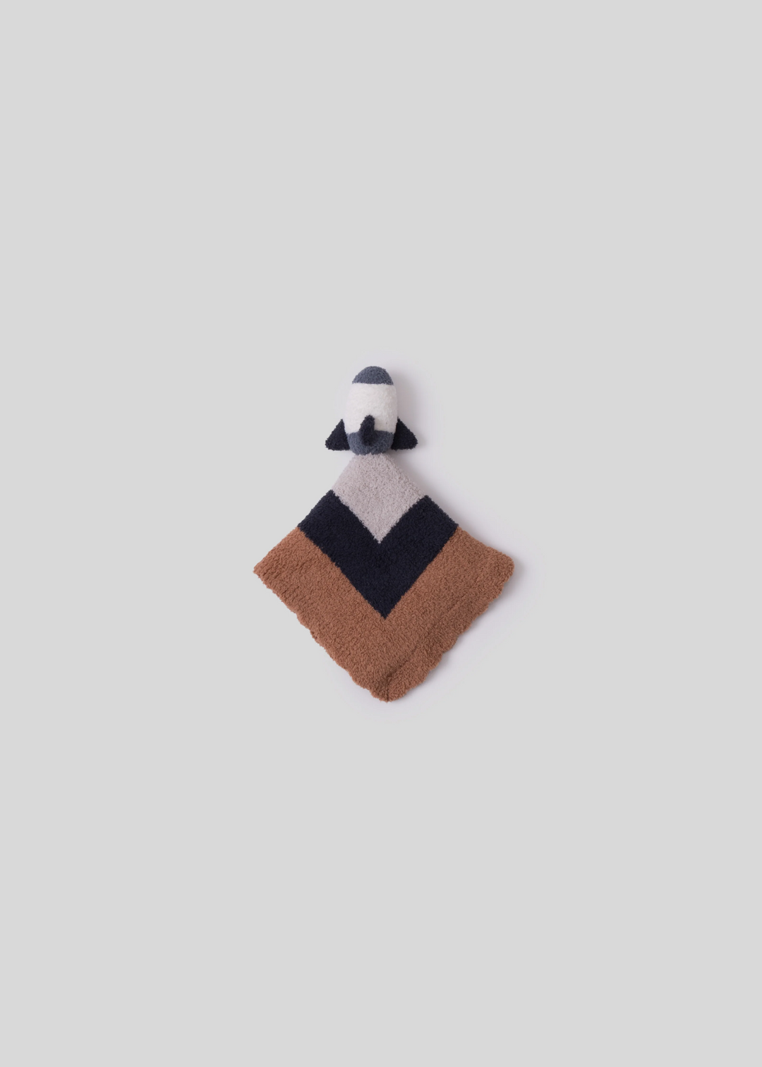 Fabric baby toy with a space ship and a brown, black, and grey color combo on a white background