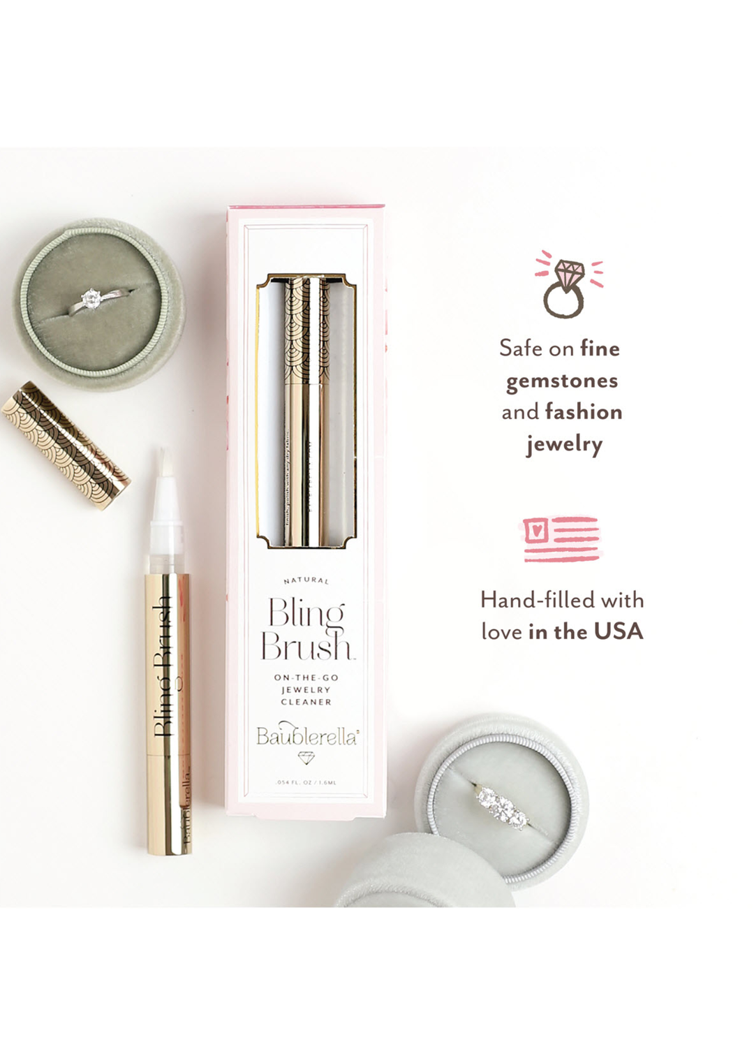 Flat lay with rings, jewelry cleaning brush, packaging, and wording