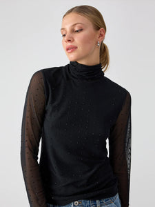 black turtleneck top with semi sheet fitted sleeves and rhinestone details in a grid across the whole top