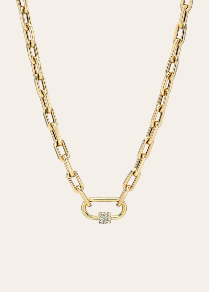 Gold chain necklace with a gold carabiner clasp on a white background