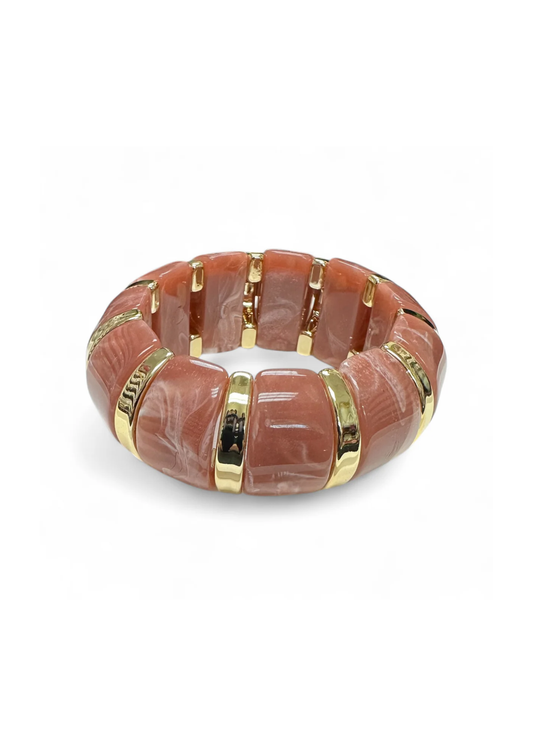 Gold and rose gold beaded stretch bracelet on a white background