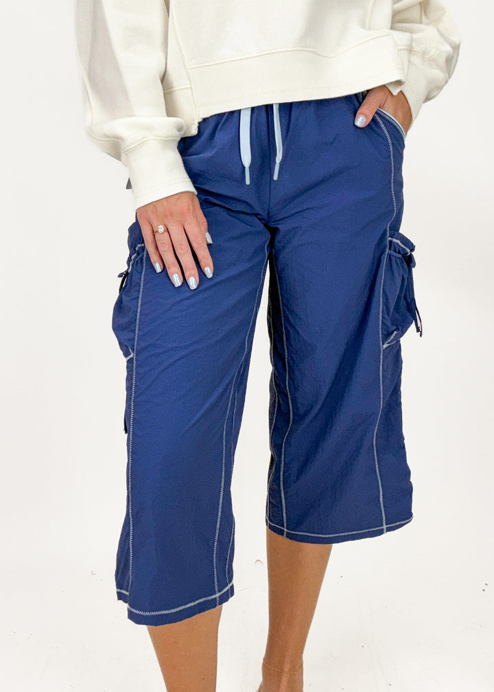 women's blue cropped wide leg cargo pants with white seam details