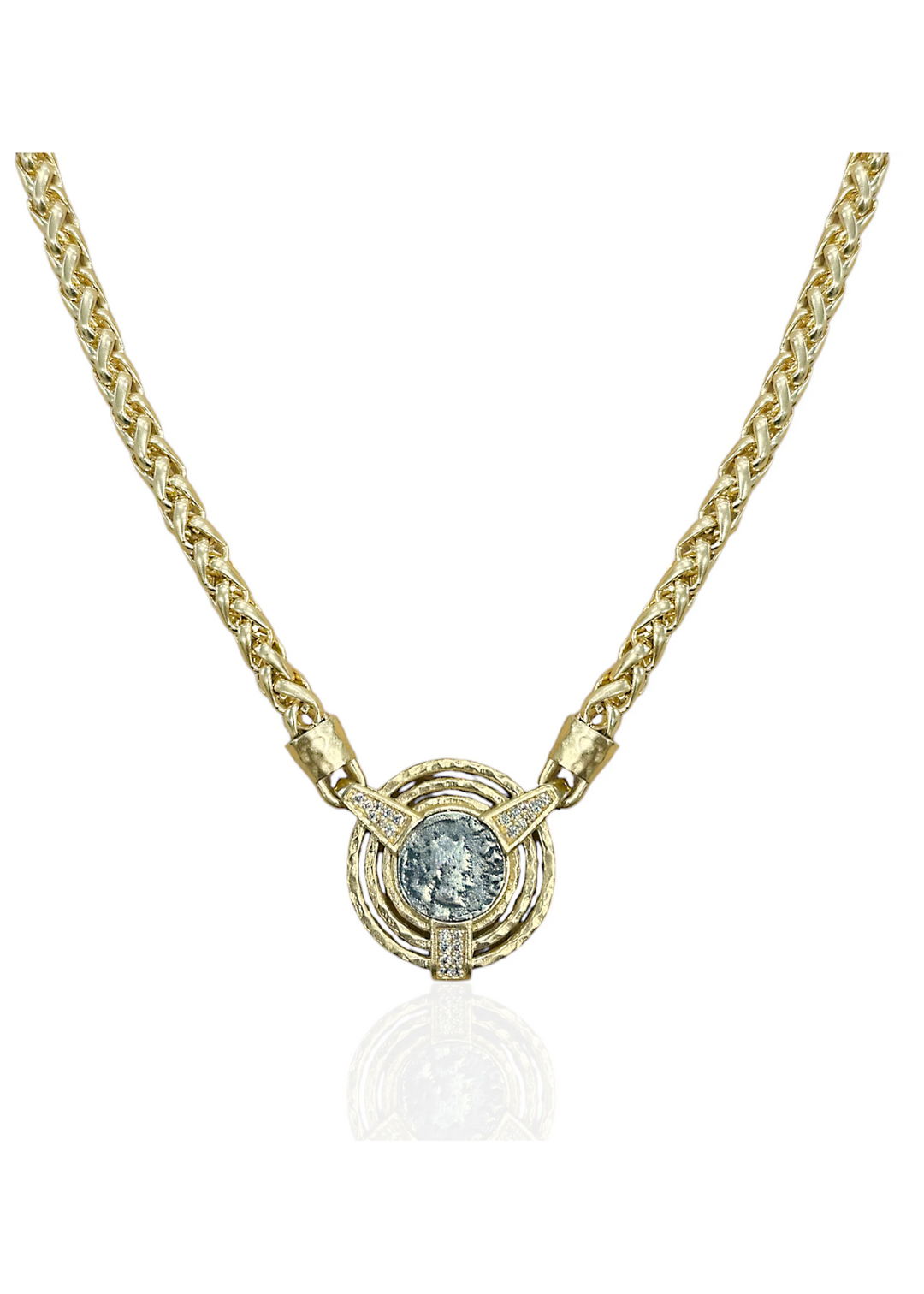 Women's gold pendant necklace with a silver coin
