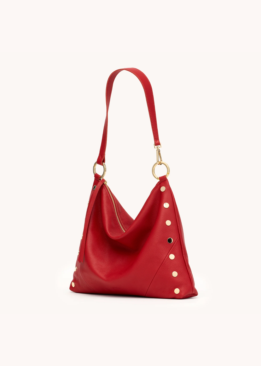 Red leather purse with gold hardware on a white background