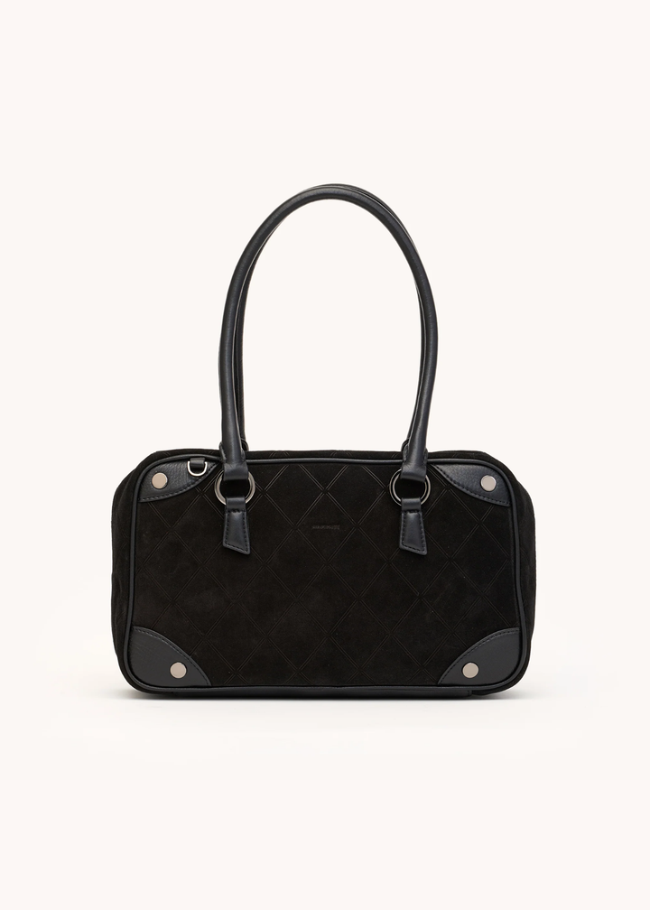 Black suede purse on a white background