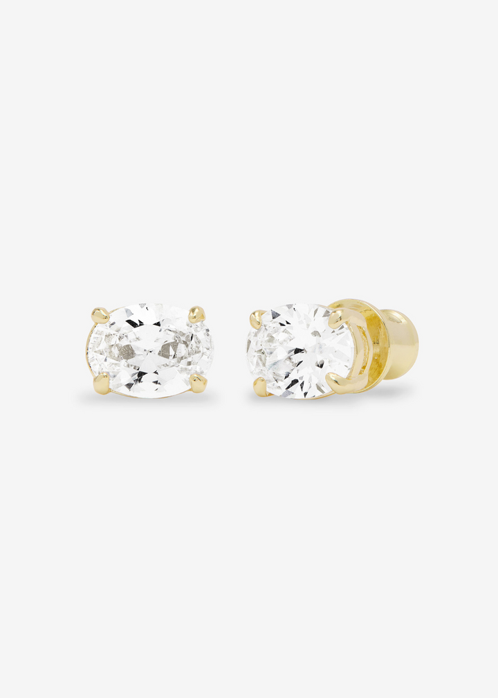 Women's oval diamond stud earrings in gold