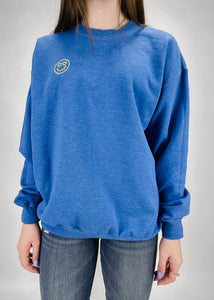 bright blue oversized drop shoulder crew neck sweatshirt with gold heart eye emoji embroidery