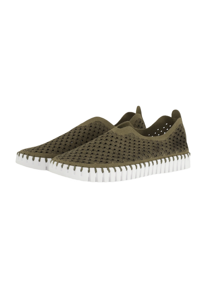 Pair of olive green slip-on perforated sneakers with white sole