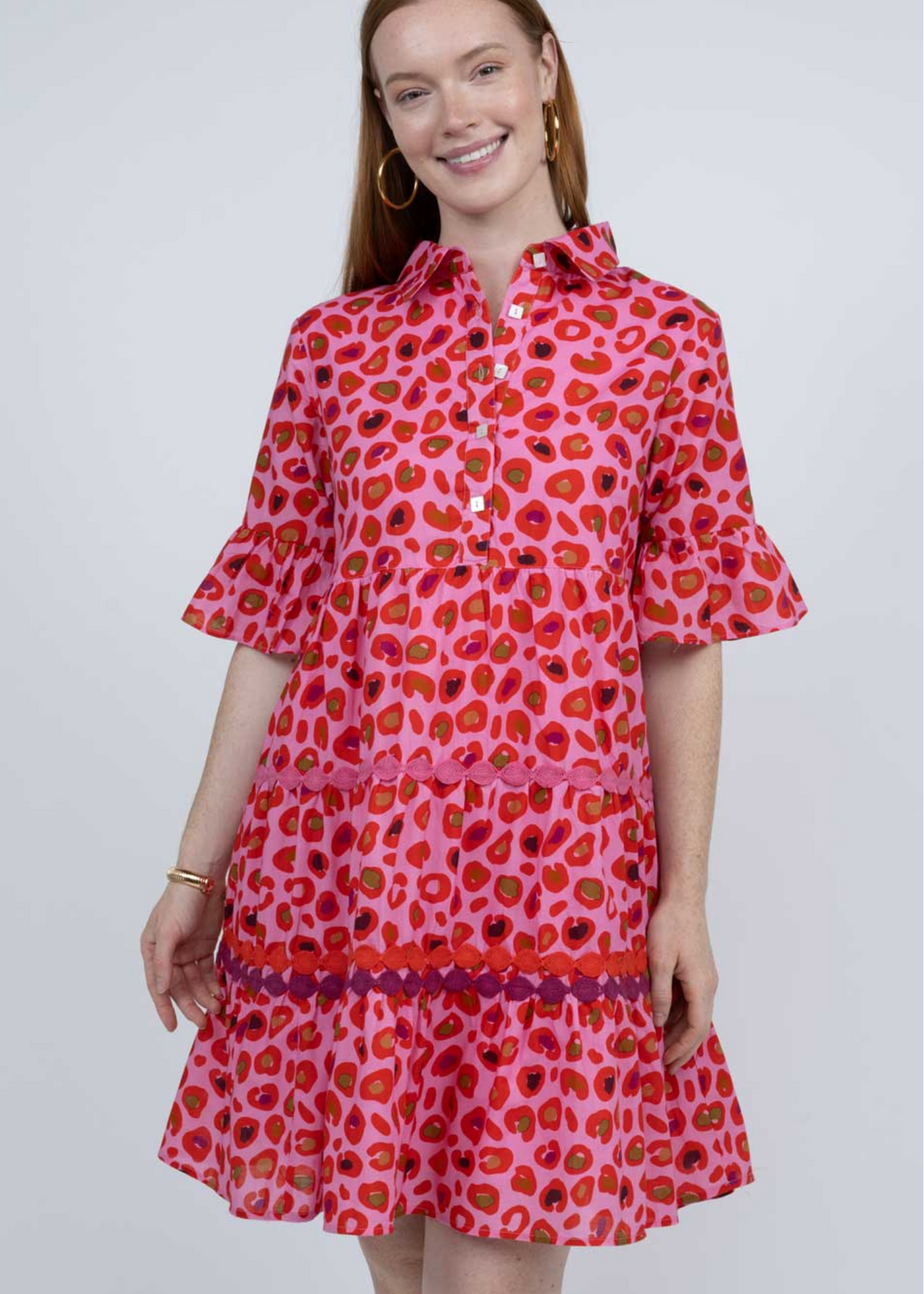 pink leopard print tiered mini dress with collar and ruffle sleeves