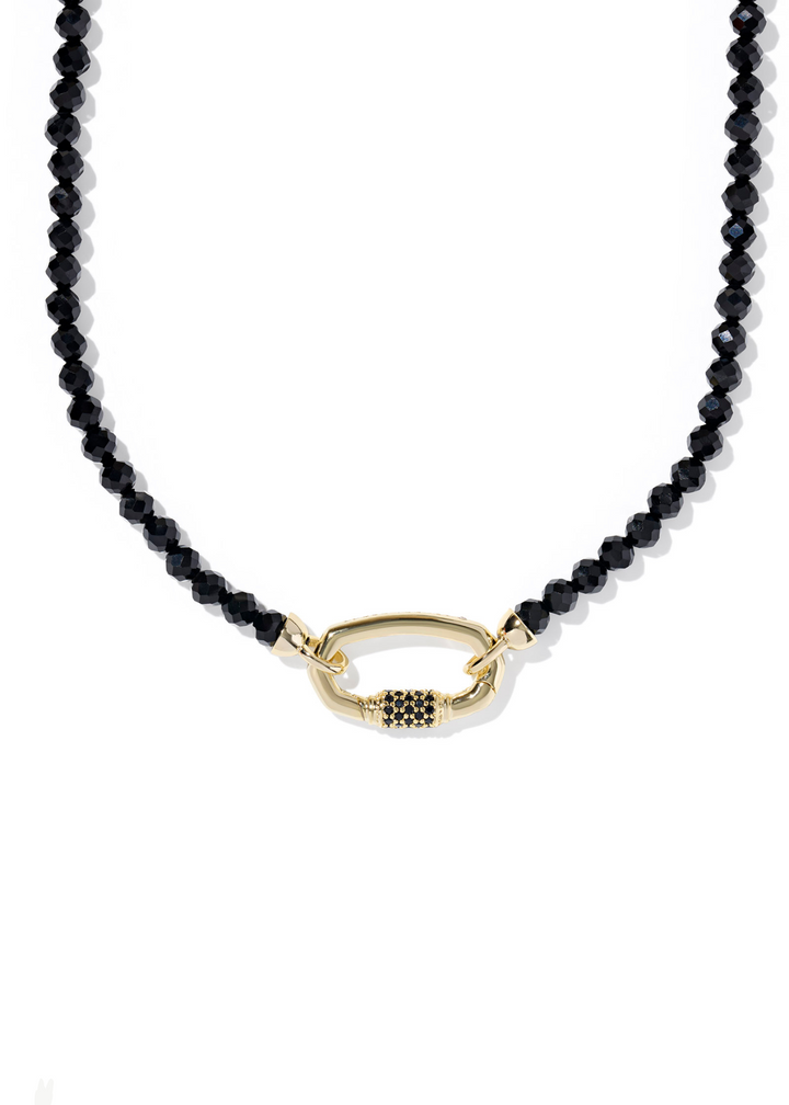 Women's black beaded strand necklace with a gold clasp