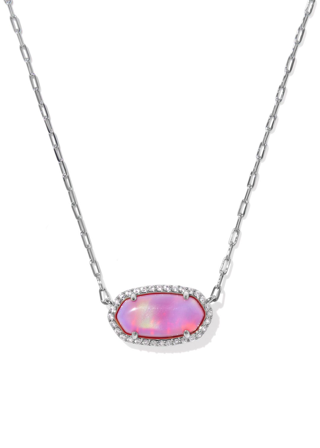 Silver necklace with a pink pendant framed in CZs on a white background