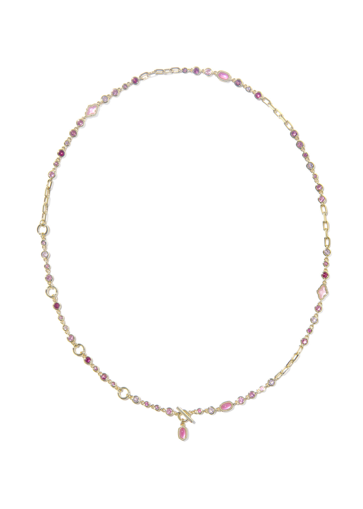 Gold necklace with pink stones against a white background
