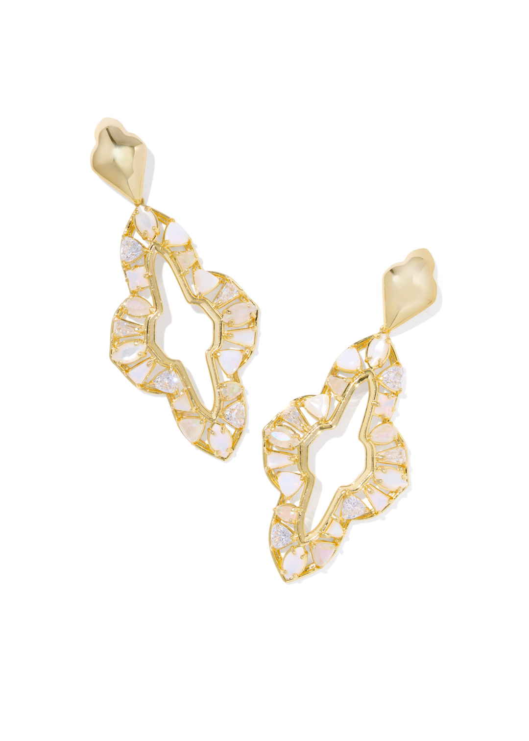 Large gold drop earrings with neutral stones on a white background