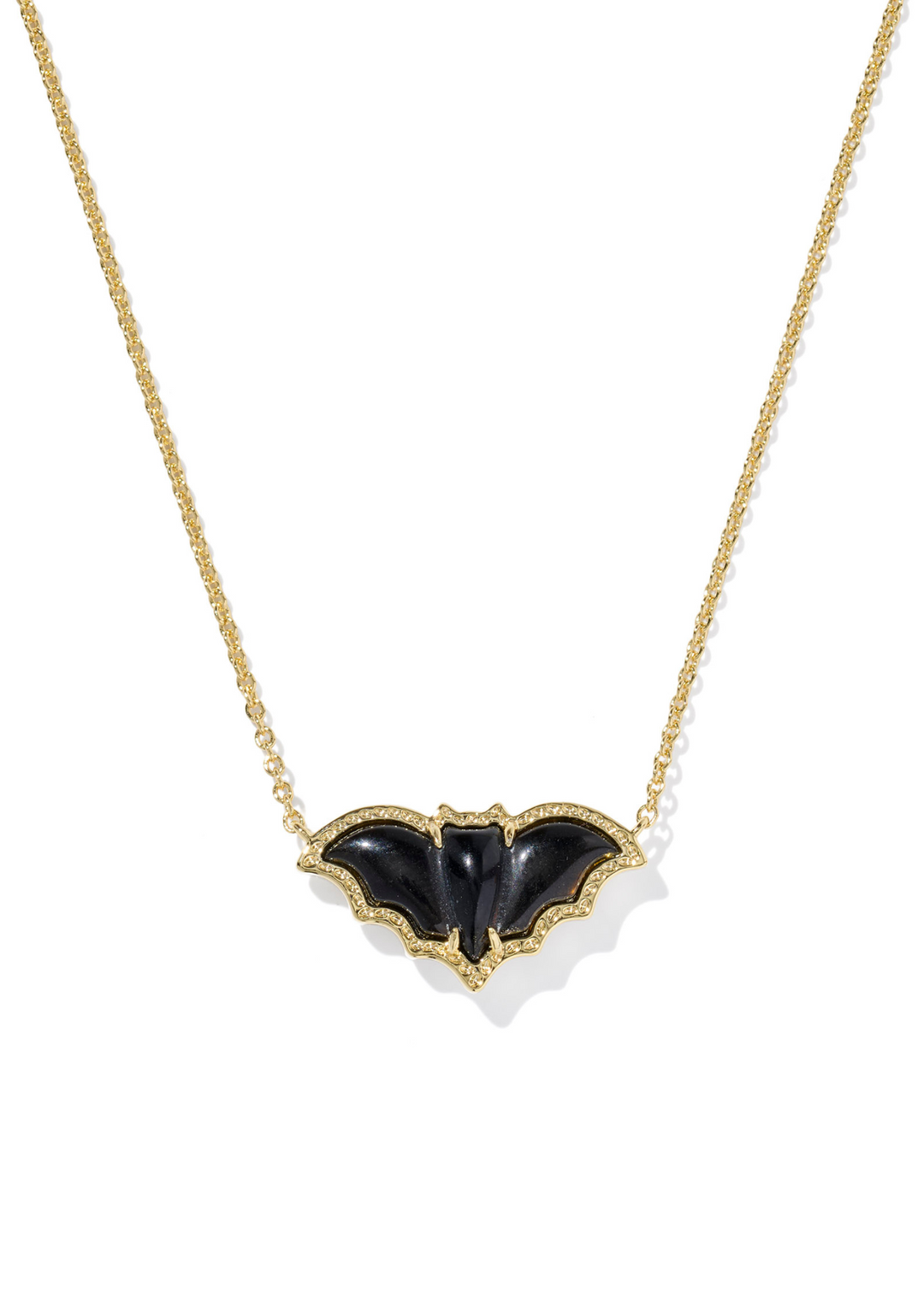 Gold necklace with a black bat pendant on a white background