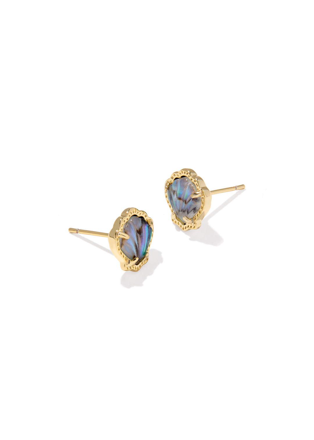 Gold framed shell shaped stud earrings with a purple stone against a white background