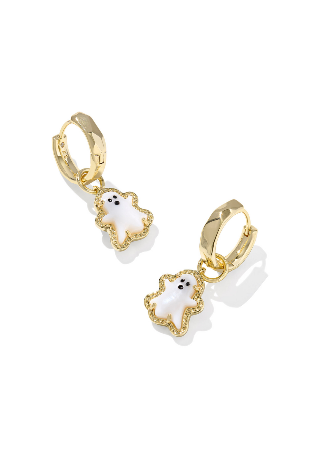 Gold ghost shaped huggie earrings with a white center stone on a white background