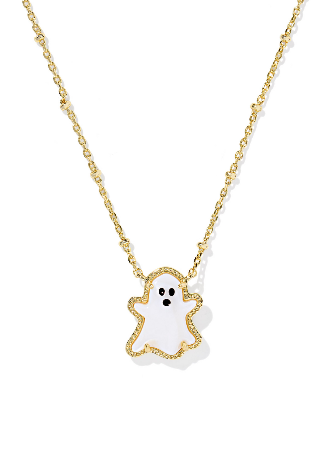Gold necklace with a white ghost pendant on a white background