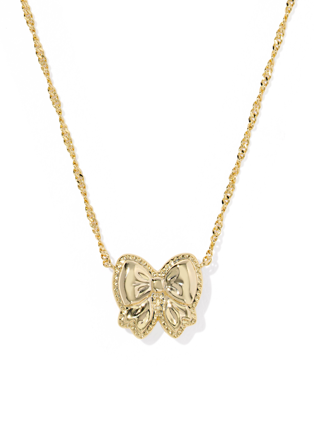 Gold necklace with a gold bow pendant on a white background