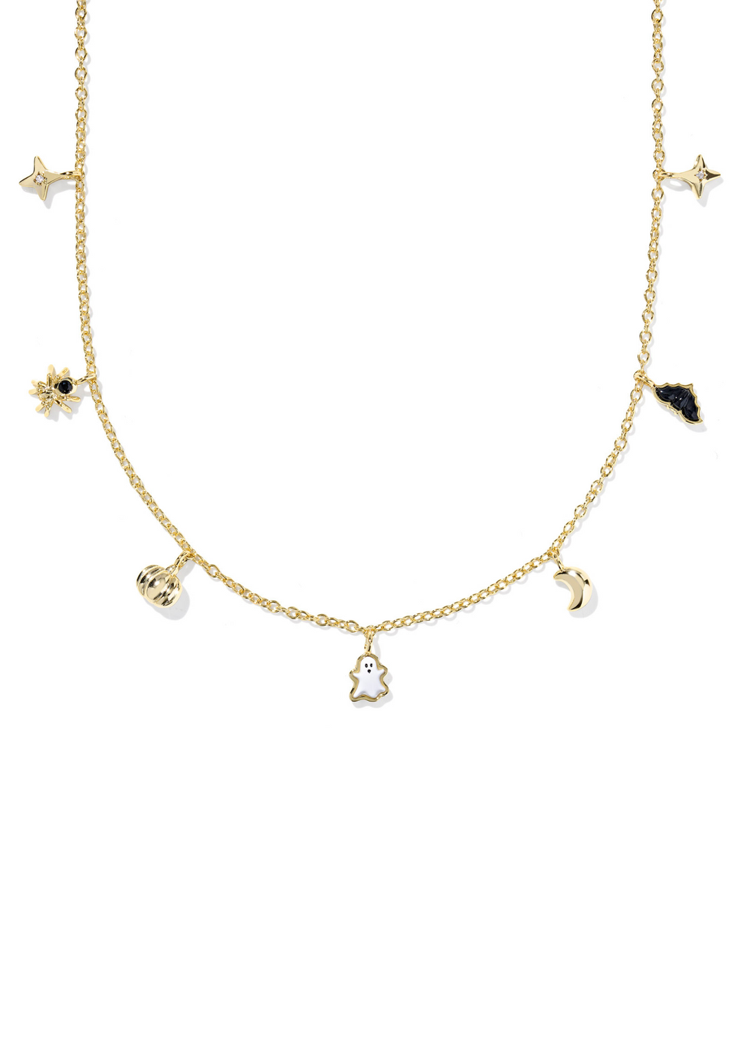 Gold strand necklace with halloween charms on a white background