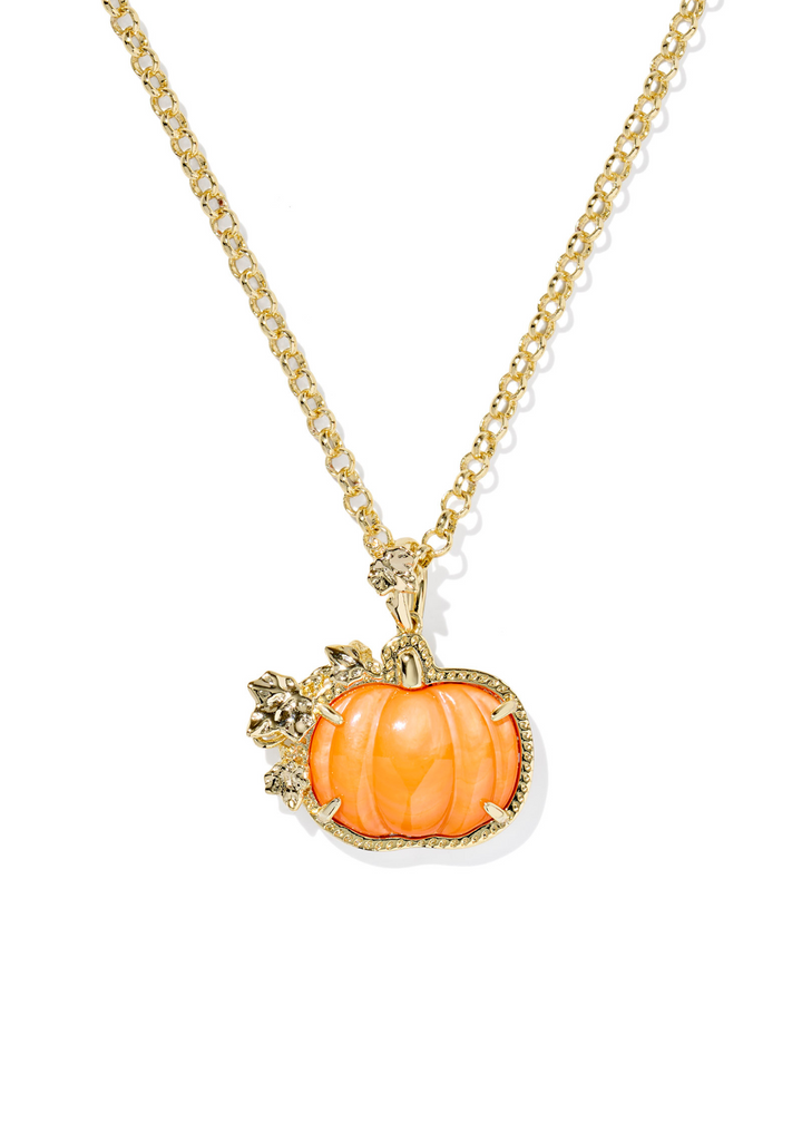 Gold necklace with an orange pumpkin pendant that is gold framed with gold leaf details on a white background