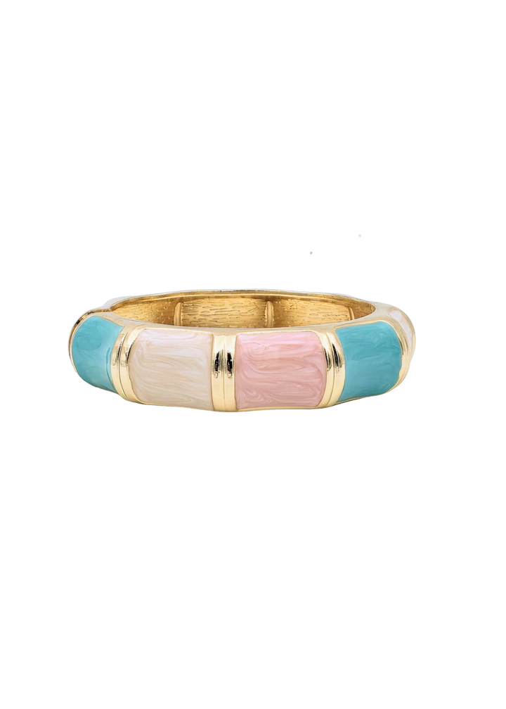 Women's gold bangle bracelet with turquoise, light pink, and beige sections