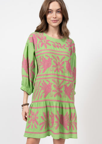 grass green mini dress with ruffle skirt and 3/4 puff sleeves with hot pink floral and bird embroidered design