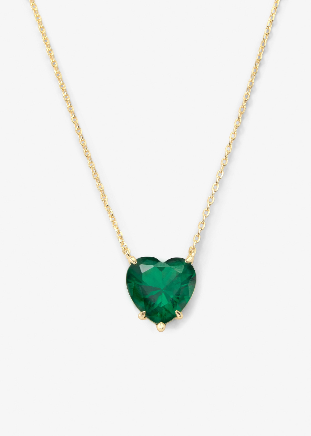 Women's gold chain necklace with a heart shaped emerald pendant
