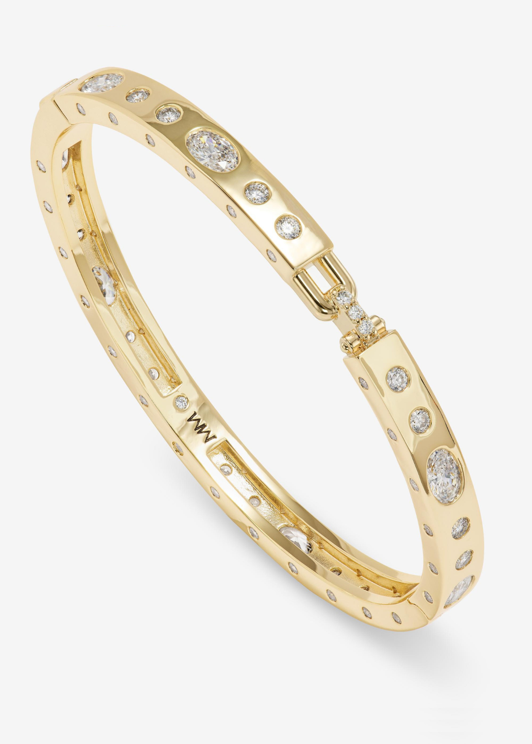 Gold cuff bracelet with CZ studding on a white background