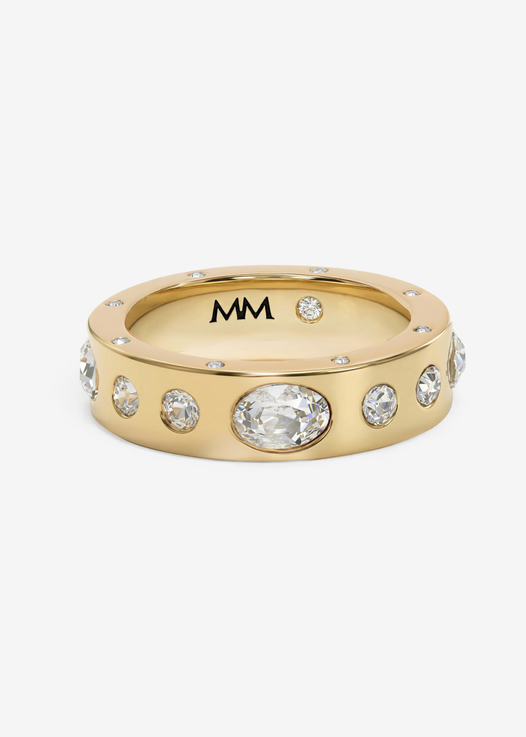 Gold band ring with CZ studs on a white background