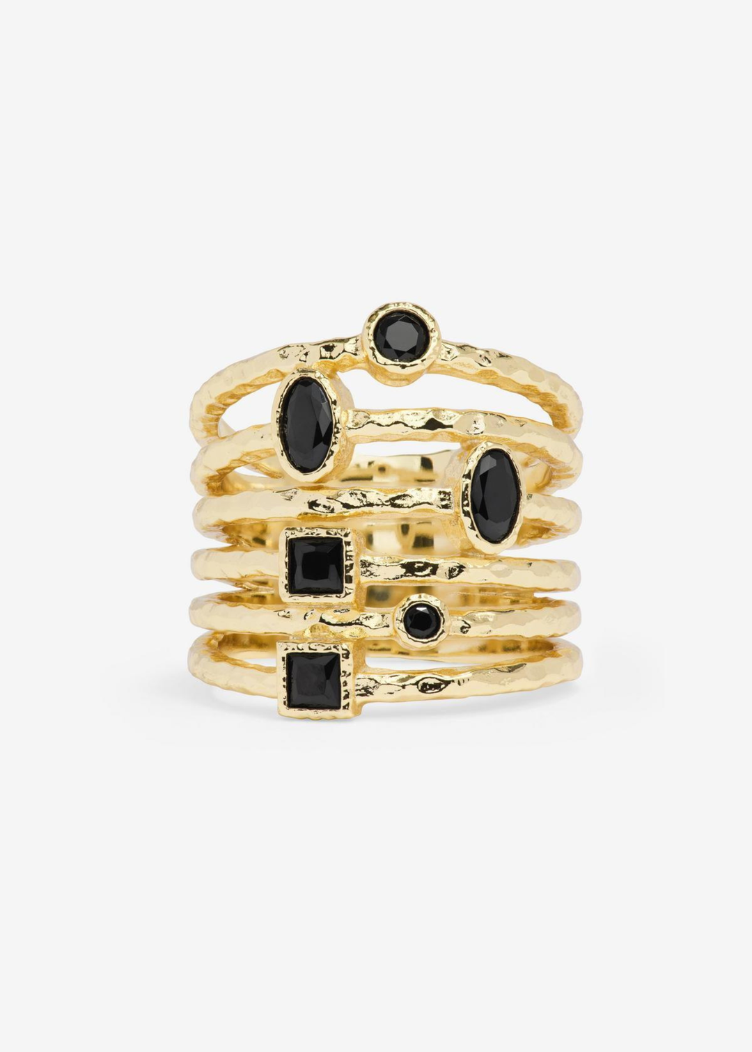 Gold stacked ring with black simulated diamonds on a white background