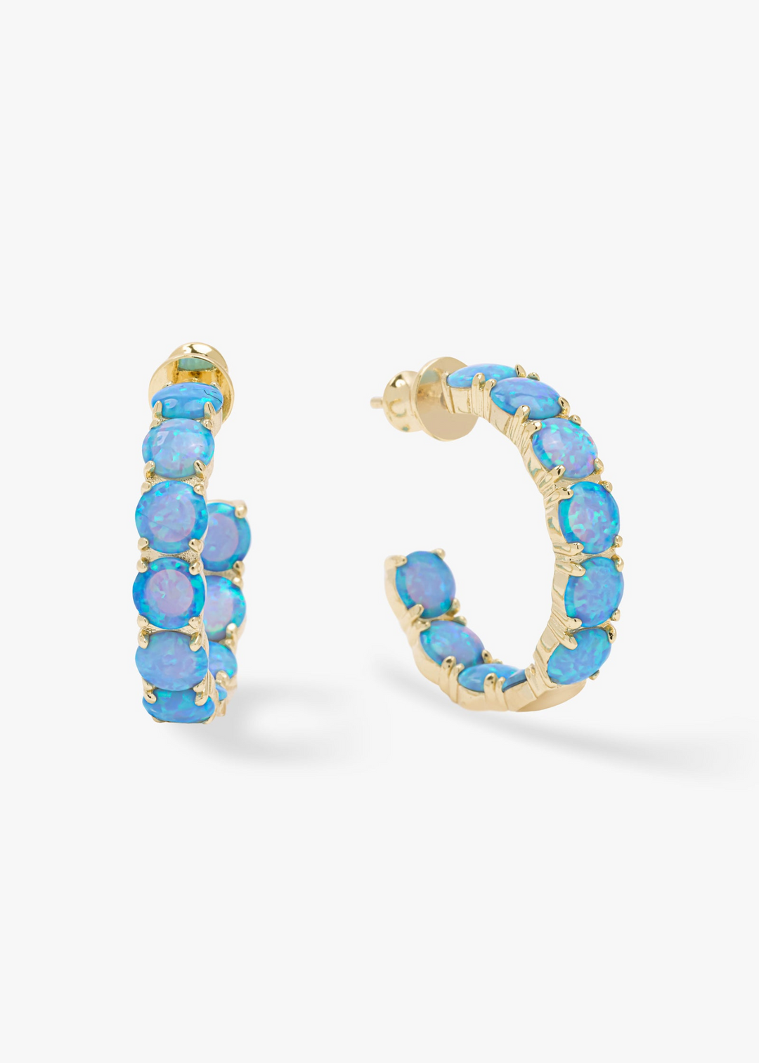 Women's gold framed blue opal hoops