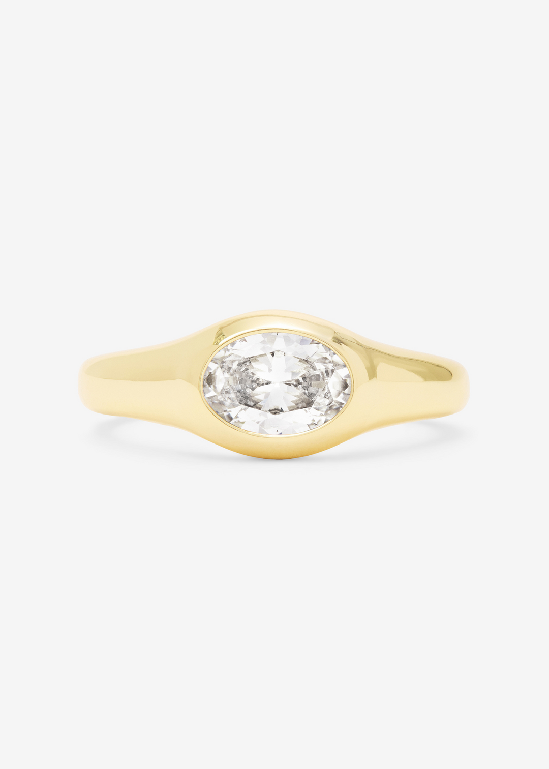 Women's gold signet ring with a bezel-set simulated diamond