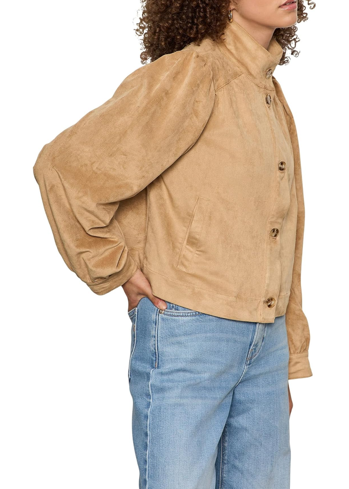 Woman wearing a brown suede jacket