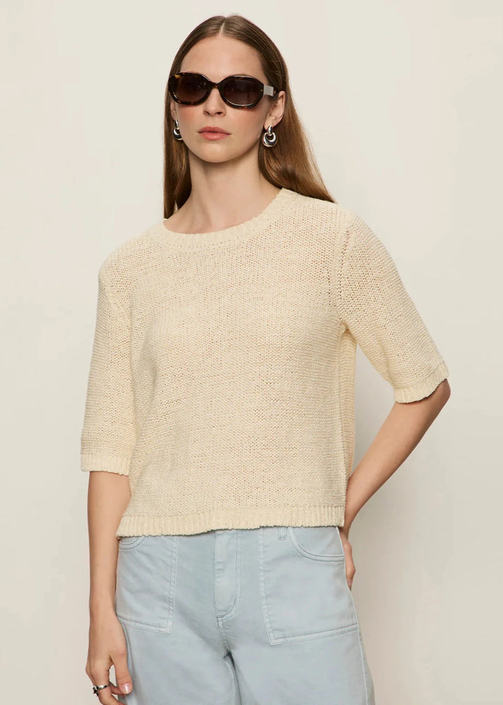 woman wearing cream tape yarn knit short sleeve tee