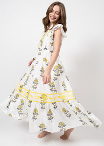 white tiered skirt ruffle sleeve maxi dress with yellow daisy print ad embroidered floral details