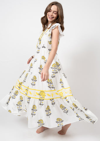 white tiered skirt ruffle sleeve maxi dress with yellow daisy print ad embroidered floral details