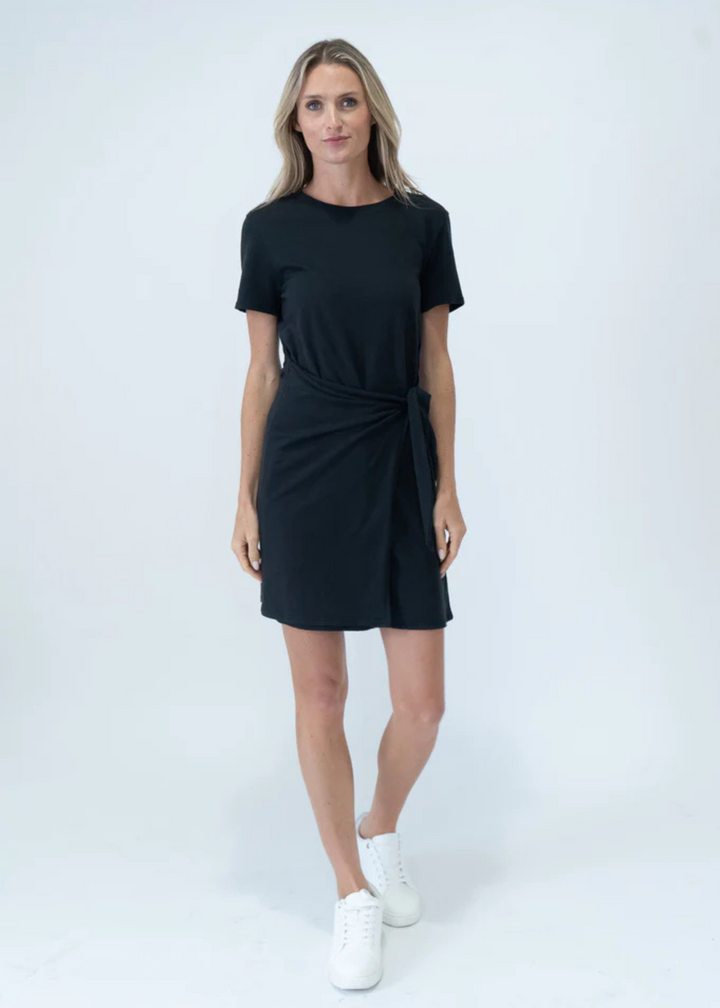 woman wearing black short sleeve wrap skirt mini dress
