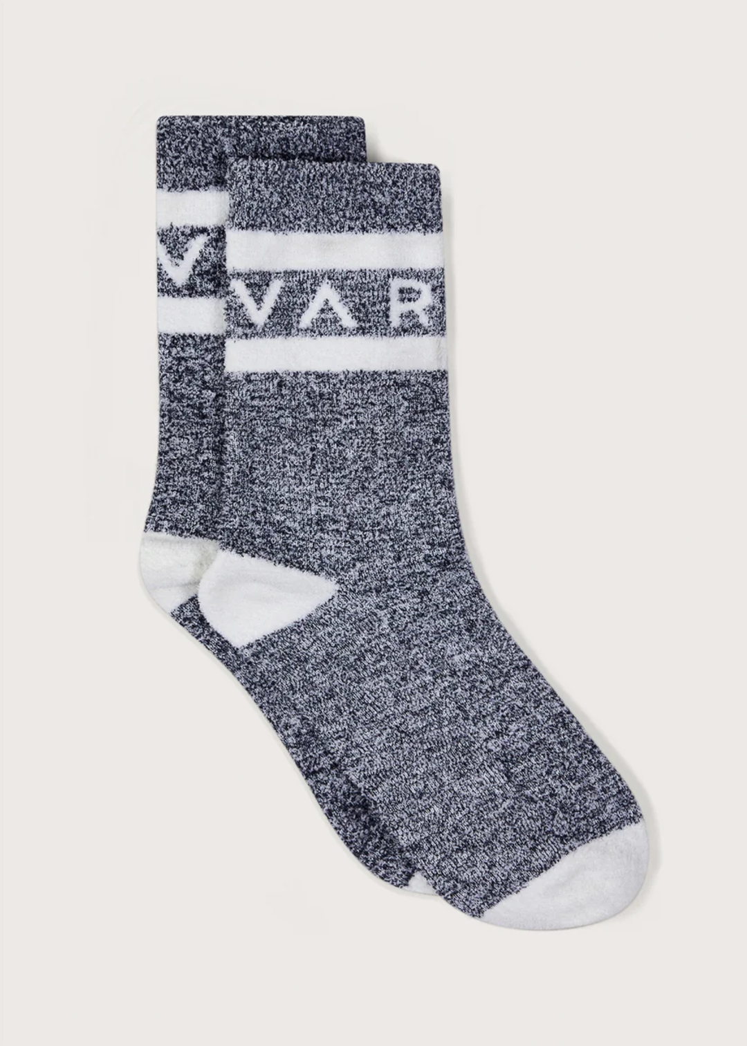 A pair of heathered dark gray crew socks with white stripes and the letters 'VAR' knitted into the cuff, shown on a light beige background.