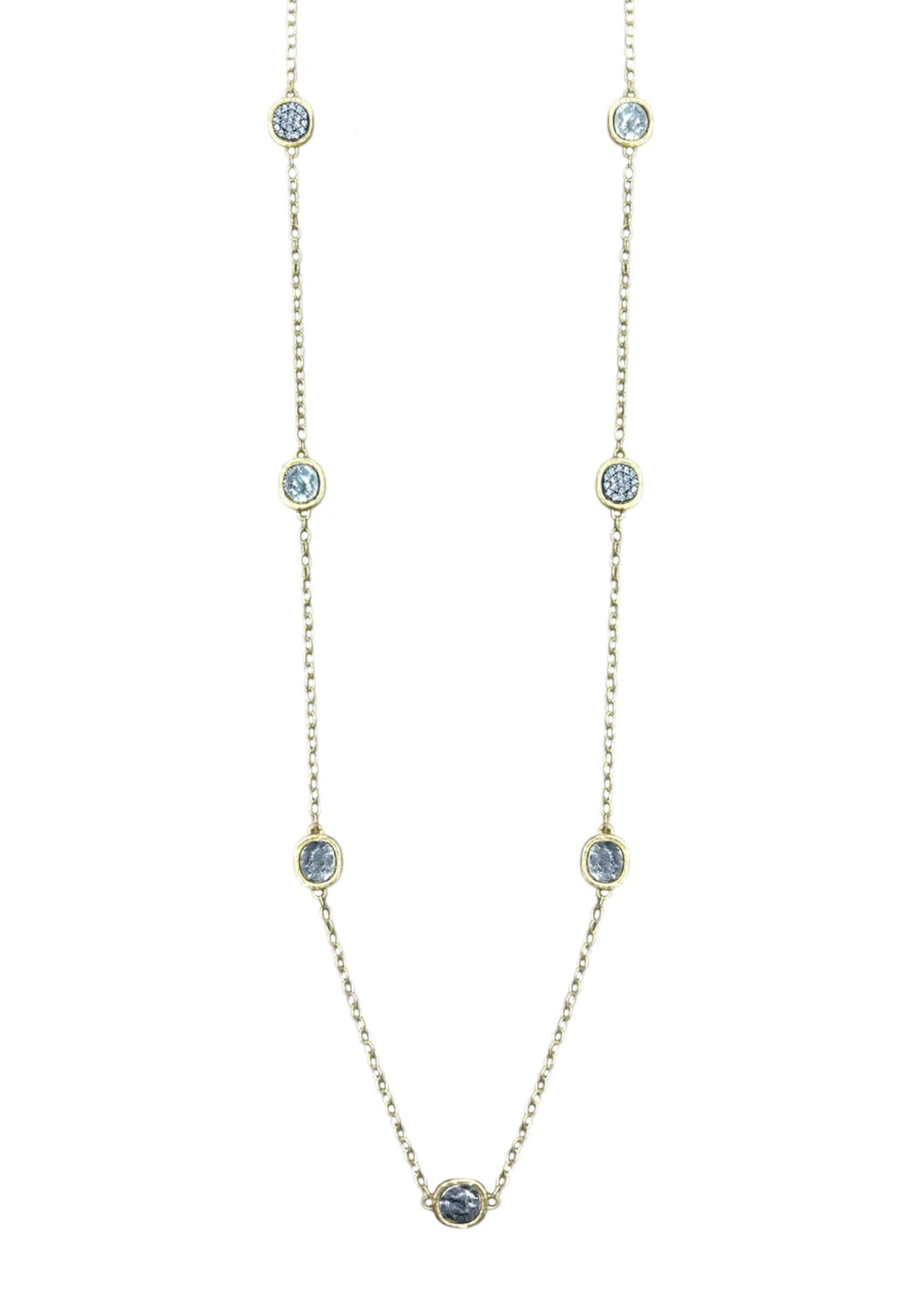 Gold chain necklace with silver coins on a white background