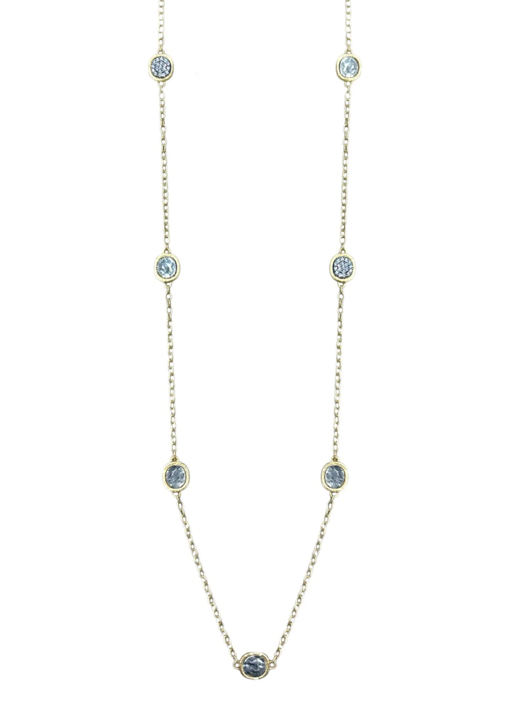 Gold chain necklace with silver coins on a white background