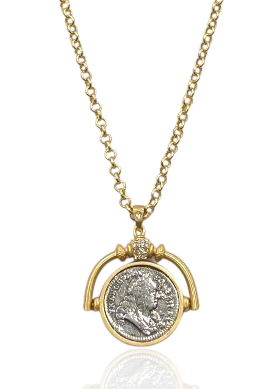 Gold necklace with a spinner and vintage coin pendant