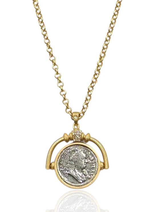 Gold necklace with a spinner and vintage coin pendant