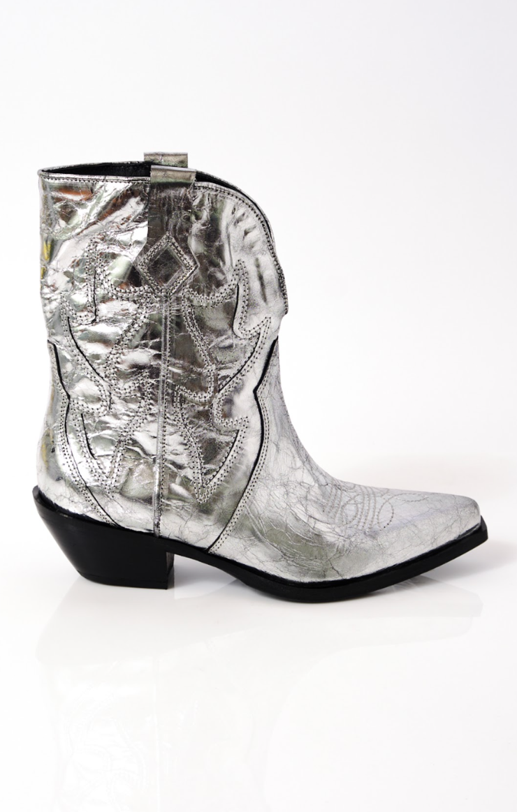 metallic silver cowboy booties with black heeled sole