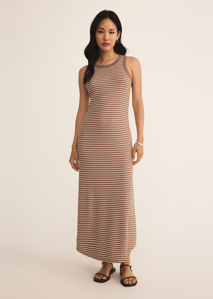 woman wearing brown and white horizontal stripe tank top maxi dress