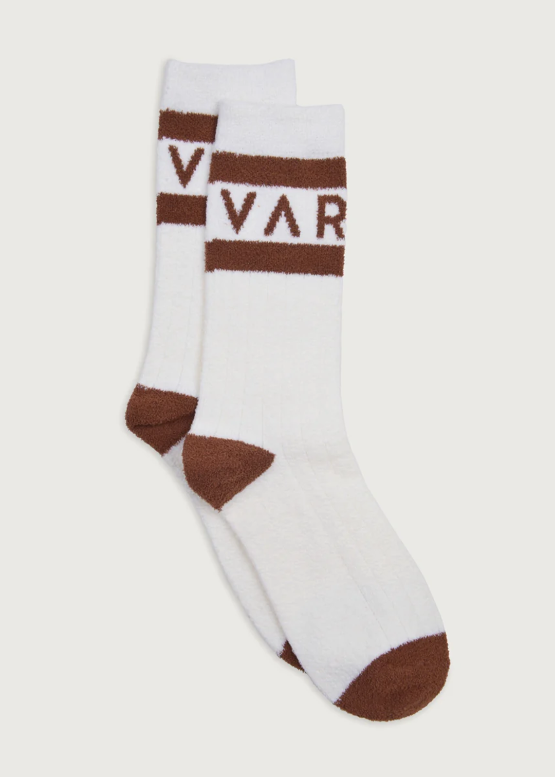 A pair of white crew socks with brown stripes and accents, featuring the partial brand name 'VAR' in brown on the upper leg.